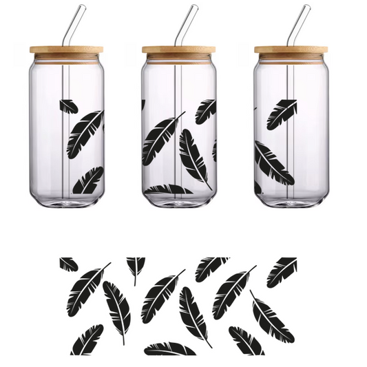 A stylish illustration of black feathers scattered across a light background, perfect for decorative or artistic purposes.UV Transfersdtf regular iron