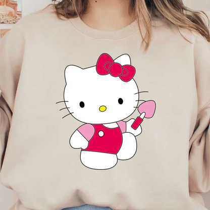 Meet Hello Kitty, the adorable white cat character sporting a vibrant red dress and a matching bow, ready to play!DTF Transfers