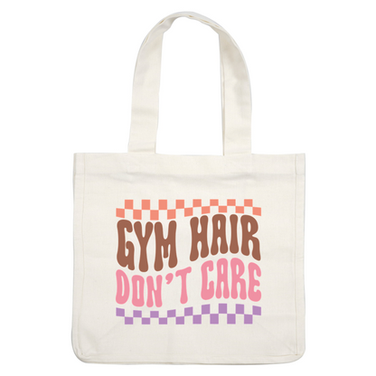 "Playful graphic design featuring the phrase 'Gym Hair Don't Care' in funky, colorful lettering with a checkerboard border." dtf transfers