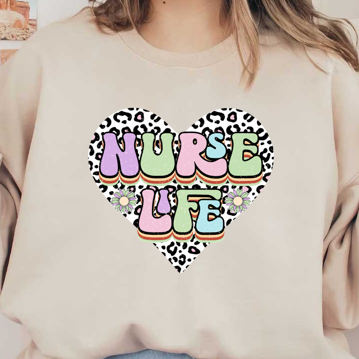 A vibrant heart-shaped design featuring the playful text "NURSE LIFE" in colorful, bold letters with cheerful flowers and a leopard print background.DTF Transfers