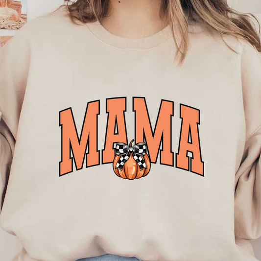 A festive "MAMA" graphic design featuring a vibrant orange color and a pumpkin adorned with a black and white bow.dtf regular iron