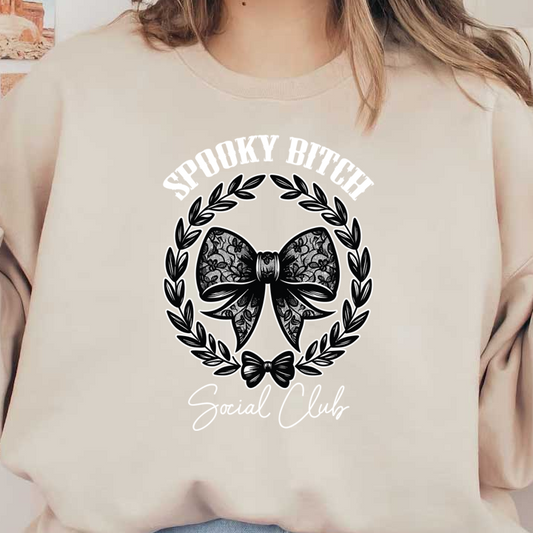 Un elegante diseño en blanco y negro que presenta un lazo de encaje, enmarcado por una corona de laurel, con "Spooky Bitch Social Club".