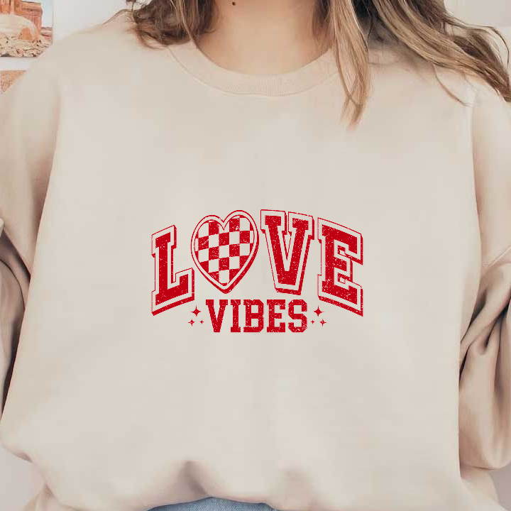 Bold red graphic featuring the words "LOVE VIBES" with a heart design, conveying a fun and energetic message.DTF Transfers