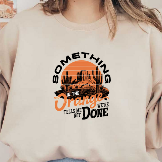 A vibrant logo featuring a desert landscape with cacti and a stylized sun, emphasizing the phrase "In the Orange." heat press transfers