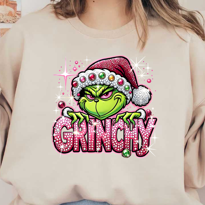 This vibrant design features the Grinch in a festive Santa hat, embellished with sparkling jewels and the playful text "GRINCHY."DTF Transfers