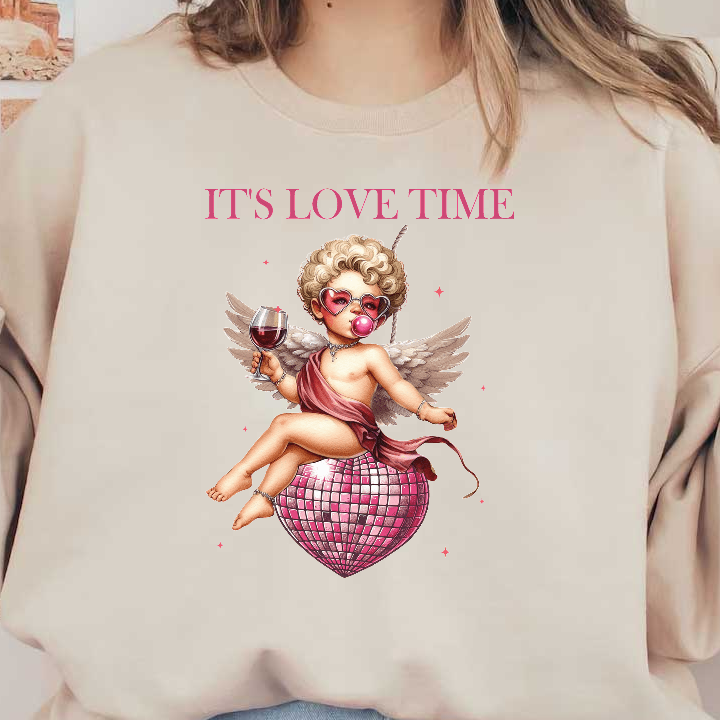 A charming cherub holding a glass of wine, resting on a sparkling pink disco heart, with the caption "IT'S LOVE TIME."DTF Transfers