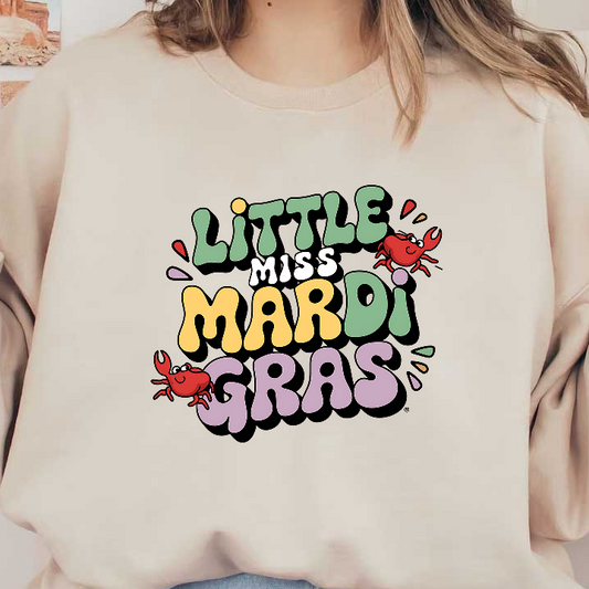 Celebrate Mardi Gras with this fun "Little Miss Mardi Gras" design featuring cheerful lettering and playful crab illustrations!DTF Transfers