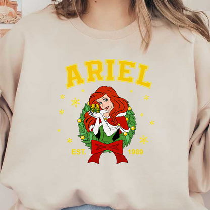 A festive design featuring Ariel with a gift, surrounded by a wreath and stars, celebrating her 1989 debut.DTF Transfers heat press transfersdtf regular iron