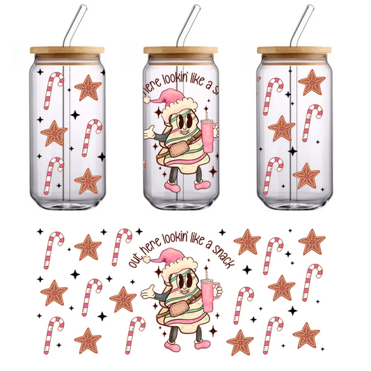 A whimsical character resembling a festive dessert, holding a drink, surrounded by candy canes and stars, celebrating the holiday spirit.UV Transfers dtf prints