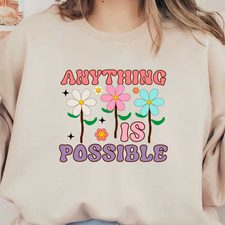 A colorful, cheerful illustration featuring smiling flowers and the phrase "Anything is Possible" in playful, vibrant letters. heat press transfers