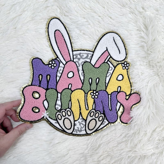 Adorable "Mama Bunny" patch with colorful letters and bunny ears, accented with cute paw prints and flowers—perfect for Easter crafts!Patches