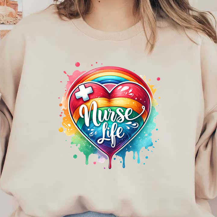 A vibrant, artistic design featuring a heart in rainbow colors, accented with a medical cross and the phrase "Nurse Life."DTF Transfers