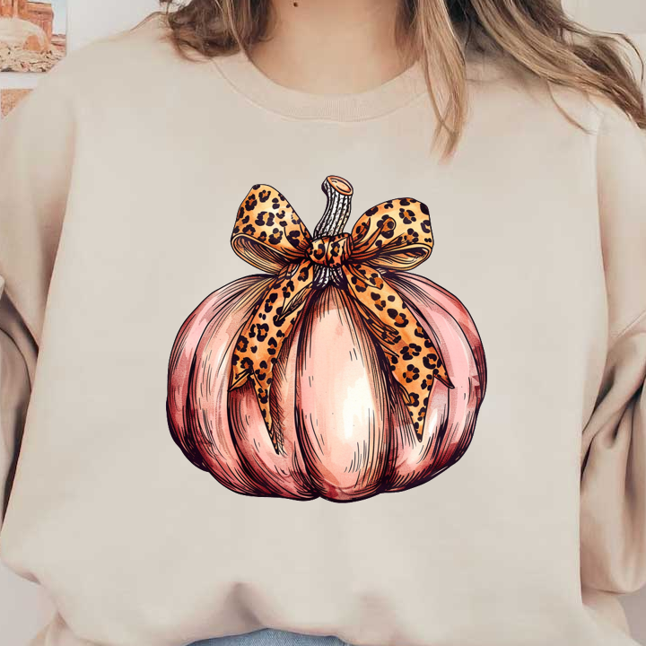 A charming pink pumpkin adorned with a stylish leopard print bow, perfect for autumn decor. dtf transfers