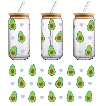 A playful pattern of avocados and hearts, featuring green fruits with brown pits and light gray hearts on a black background.UV Transfers heat press transfers