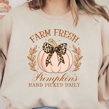 A stylish graphic featuring a soft pink pumpkin adorned with a leopard-print bow, emphasizing fresh, handpicked pumpkins.dtf regular iron