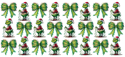 A festive collection of cartoon frogs wearing Santa hats, surrounded by vibrant green bows and holiday decorations.UV Transfers dtf prints