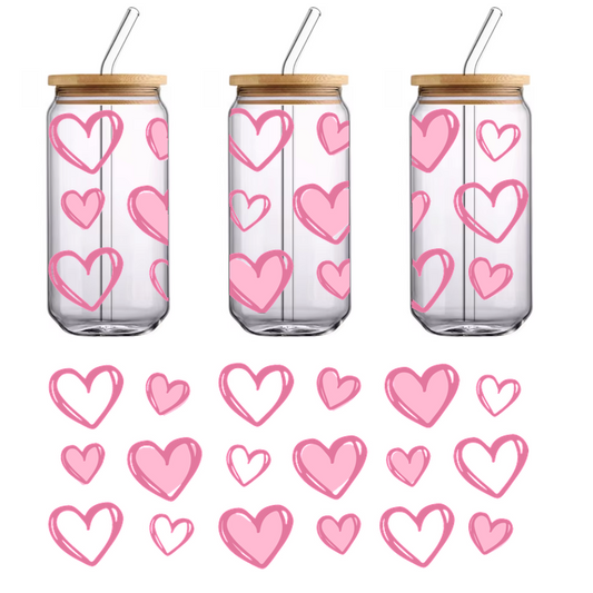 A colorful assortment of pink hearts in various sizes and styles, perfect for expressing love and affection.UV Transfers dtf prints