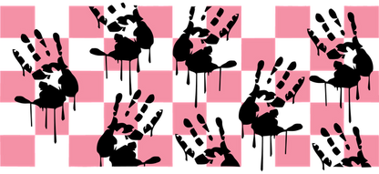 A playful design featuring black handprints with dripping details against a pink checkerboard background.UV Transfers heat press transfers