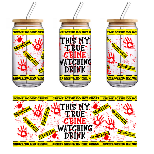 A bold and dramatic design featuring crime scene tape, bloody handprints, and the word "CRIME" prominently displayed.UV Transfers heat press transfers