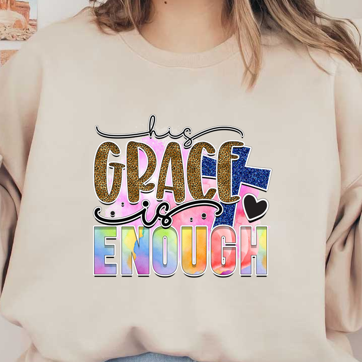 A vibrant and inspirational graphic design featuring the phrase "His Grace is Enough," adorned with colorful watercolor effects and animal print accents.DTF Transfers