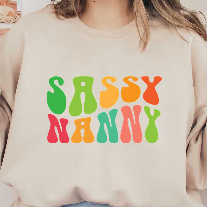 Diseño de texto colorido y divertido con las palabras "Sassy Nanny" en formas vibrantes y abstractas.