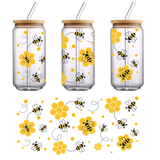 A vibrant pattern featuring yellow honeycombs, bees, and circles, creating a cheerful, nature-inspired design on a black background.UV Transfersdtf regular iron