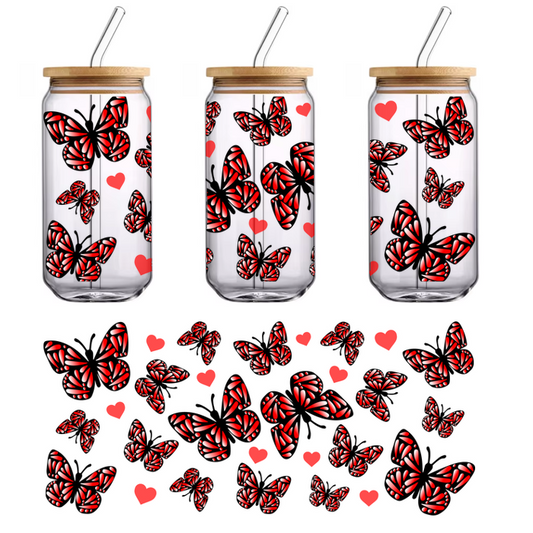 A vibrant pattern featuring red butterflies and hearts, creating a whimsical and romantic design on a black background.UV Transfers dtf transfers