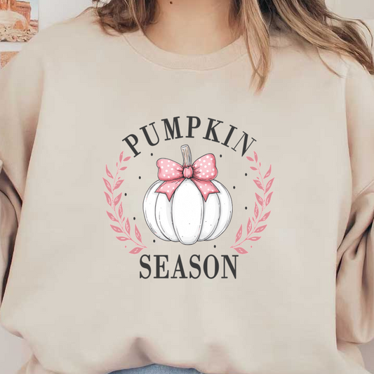 A festive illustration featuring a white pumpkin decorated with a pink polka dot bow, surrounded by floral accents, celebrating "Pumpkin Season." heat press transfers