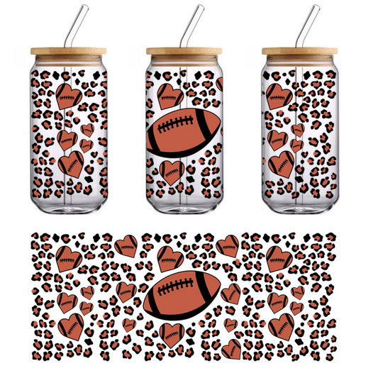 A playful pattern featuring a prominent football surrounded by cheering hands, perfect for sports enthusiasts and game day decor.UV Transfersdtf regular iron