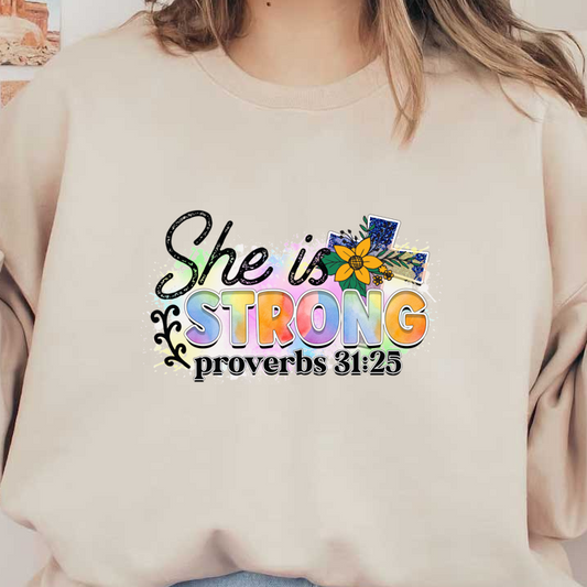 A vibrant and inspirational design featuring "She is STRONG" with colorful letters and a floral accent, inspired by Proverbs 31:25.DTF Transfers