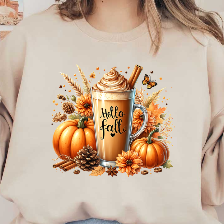 Una acogedora bebida con temática otoñal que incluye un café con leche cremoso de calabaza cubierto con crema batida y canela, rodeado de decoraciones otoñales.