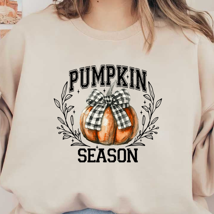 A charming orange pumpkin adorned with a stylish black and white checked bow, perfect for autumn decorations.dtf regular iron