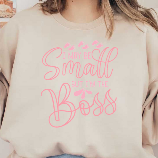 This playful graphic features the phrase "I may be small but I'm the boss" in pink, highlighting confidence and fun.DTF Transfers