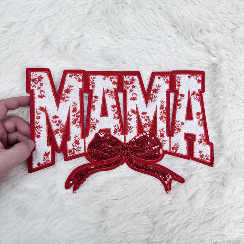 Colorful "MAMA" patches featuring sequined bows, available in pink, red, blue, and light blue, perfect for crafting or embellishing.Patches