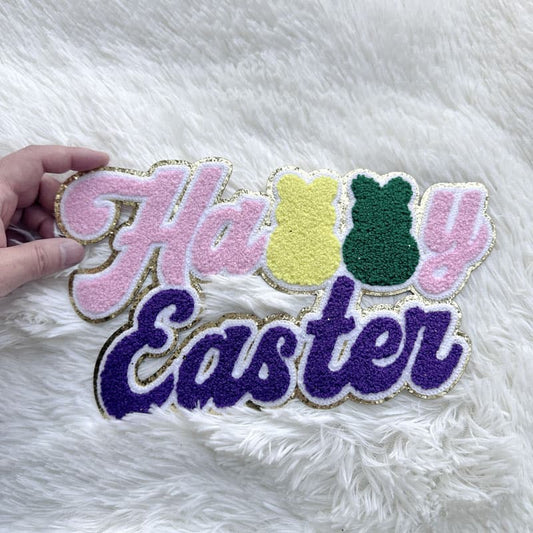 Colorful ‘Happy Easter’ chenille patch with bunny silhouettes, glitter accents, and vibrant pastel lettering—perfect for festive DIY projects!