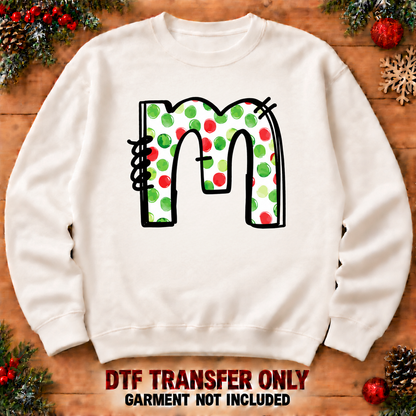 Christmas polkadot lowercase letter m DTF transfer XMAS1476-13 shown at12-inch longest side on sweatshirt. Garment not included.