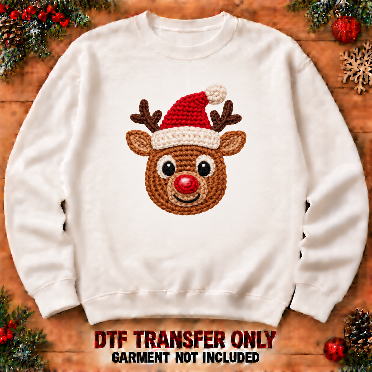 Crochet-look Christmas reindeer face DTF transfer XMAS1480-20 shown at12-inch longest side on sweatshirt. Flat printed texture; garment not included.