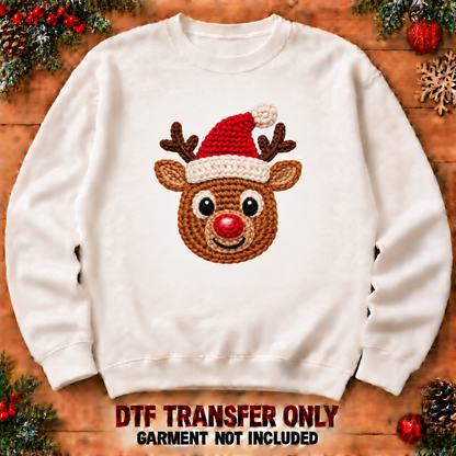 Crochet-look Christmas reindeer face DTF transfer XMAS1480-20 shown at12-inch longest side on sweatshirt. Flat printed texture; garment not included.