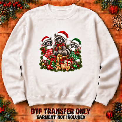 Christmas raccoon family DTF transfer shown at 12-inch longest-side scale; garment not included