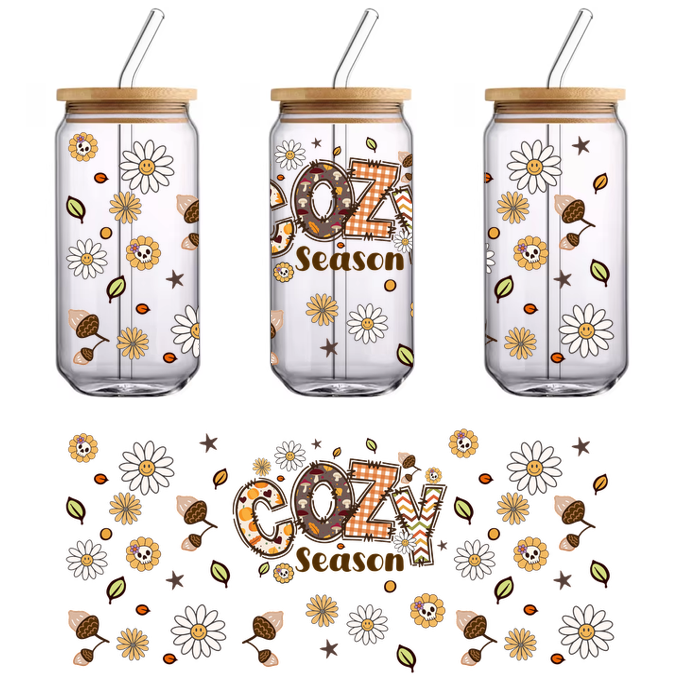 A whimsical "Cozy Season" design featuring cheerful daisies, acorns, and playful skulls, perfect for autumn decorations.UV Transfers dtf transfers