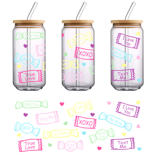 a heart shaped pastel sign with words such as 'love', 'hugs, 'to me', true love.UV Transfers