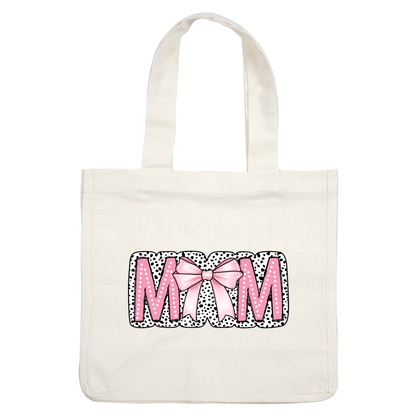 A vibrant and playful "MOM" design featuring bold pink letters and a cute polka dot background with a stylish bow. heat press transfers