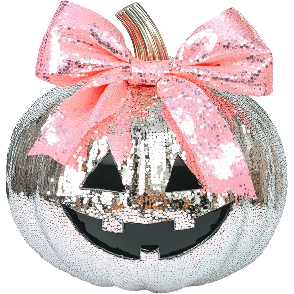 Sparkling silver pumpkin with a black jack-o'-lantern face and a lovely pink sequin bow, perfect for Halloween decor.