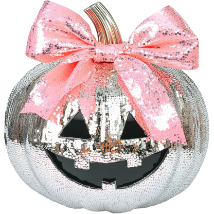 Sparkling silver pumpkin with a black jack-o'-lantern face and a lovely pink sequin bow, perfect for Halloween decor.