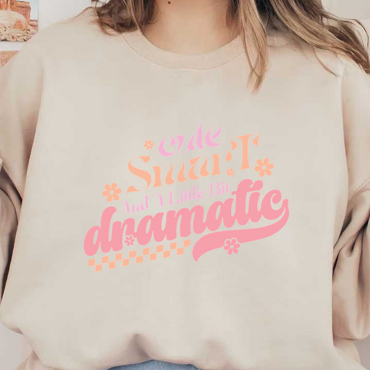 Express your fun personality with this playful typography design featuring the words "Cute, Smart, and a Little Bit Dramatic" in soft pink hues.DTF Transfers