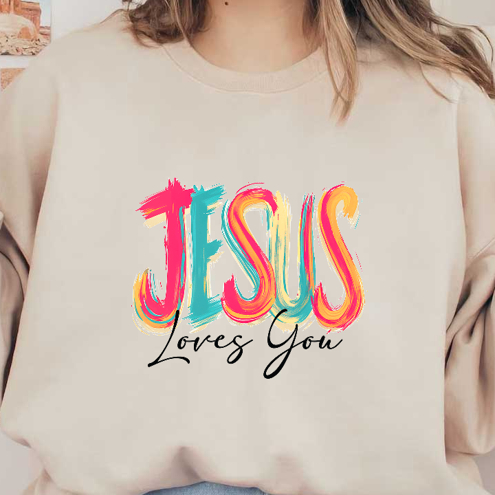 Colorful text design stating, "Jesus Loves You," in vibrant brush strokes.DTF Transfers