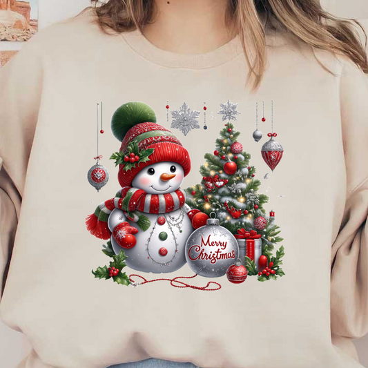 A cheerful snowman in a festive red and green outfit stands next to a decorated Christmas tree, holding a "Merry Christmas" ornament.DTF Transfersdtf regular iron