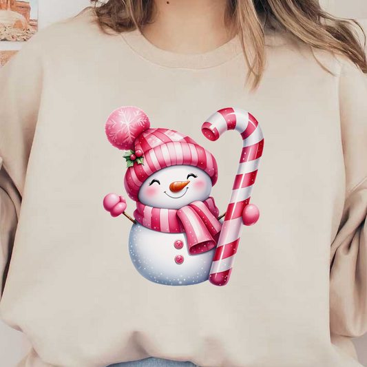 Cheerful snowman adorned with a pink striped hat and scarf, happily holding a candy cane, perfect for the festive season! dtf prints