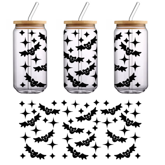 A whimsical black and white pattern featuring playful stars and cloud shapes, perfect for adding a magical touch to any design.UV Transfersdtf regular iron