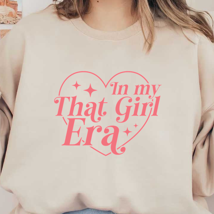 Un diseño divertido que presenta la frase "In my That Girl Era" dentro de un corazón, acentuado con estrellas.